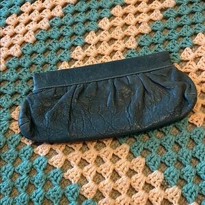 Leather Clutch with Mechanical Side Hinges – Used